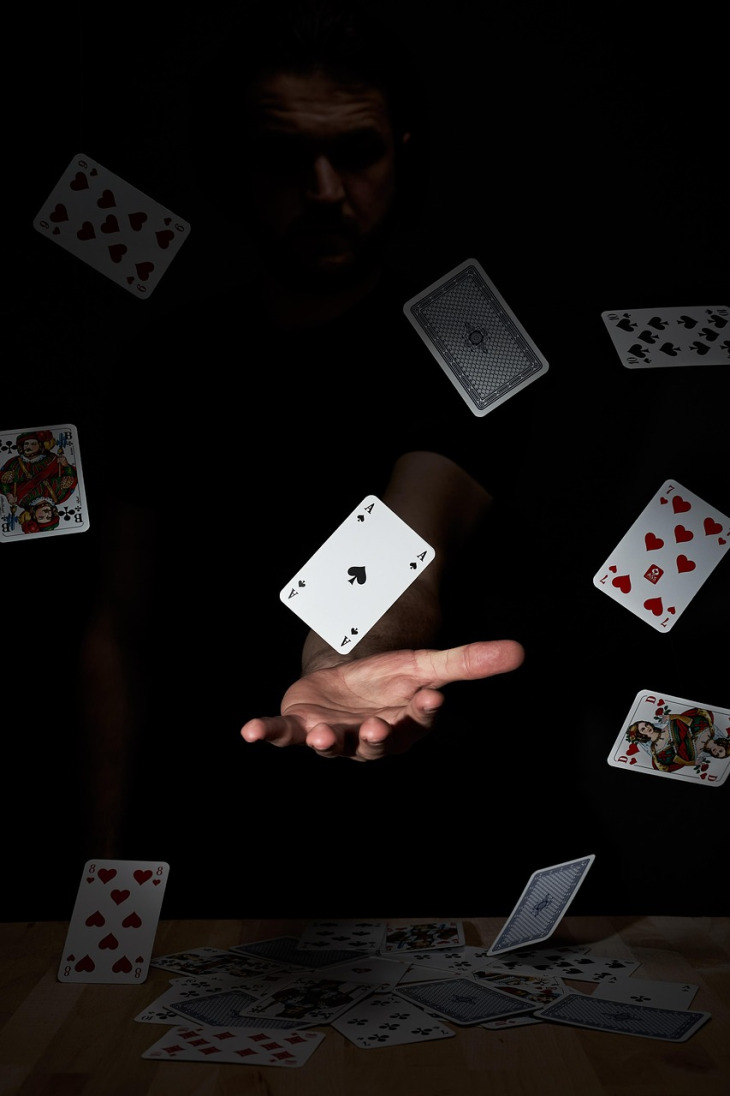 Ace playing card and poker chips on a live casino table